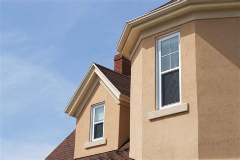 Vinyl Siding vs. Stucco: Which is Better? - Rise Renovation