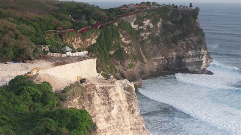 Road construction in Uluwatu, Bali. The work of escalators and the ...