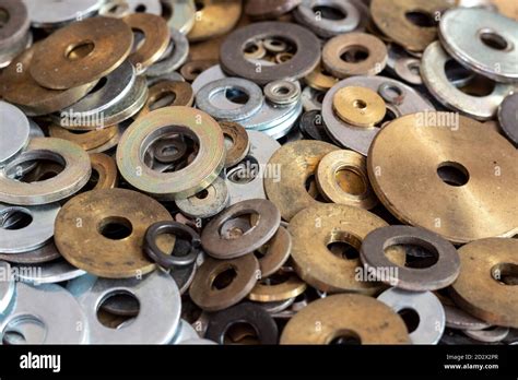 Steel and brass washers of various sizes and diameters Stock Photo - Alamy