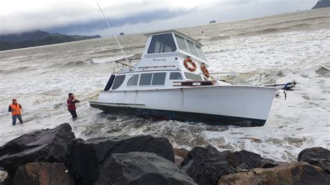 Wild Whitianga weather rips launch from mooring, washes up on beach ...