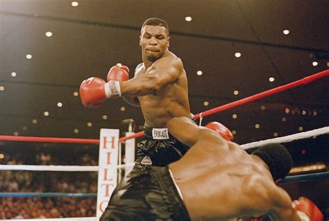 Mike Tyson knocks down Trevor Berbick on November 22, 1986. : OldSchoolCool