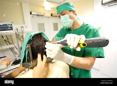 Treatment of a meningioma (benign brain tumor) with a Gamma knife, A ...