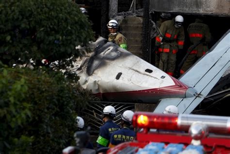 Tokyo plane crash kills 3, including woman on the ground | CBC News