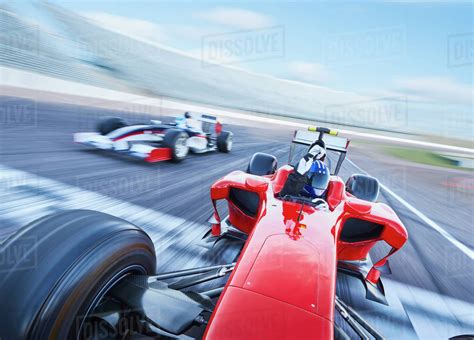 Formula one race car crossing finish line on sports track - Stock Photo ...