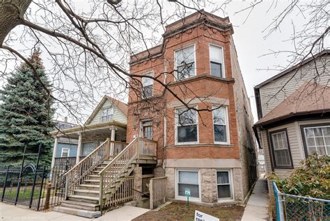 Vintage red brick apartment exterior located in the Logan Square ...