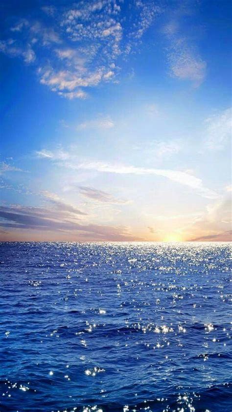 Rising Sun Over Blue Ocean