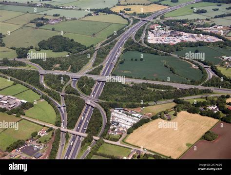 Aerial view of the M56 & M6 motorways junction interchange at Lymm ...