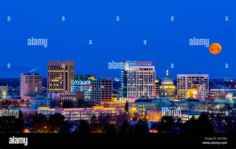 Boise Idaho skyline at night with moon Stock Photo - Alamy