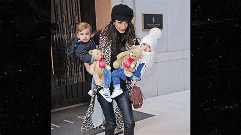 Amal Clooney Carries Her Adorably Dressed Twins Around NYC