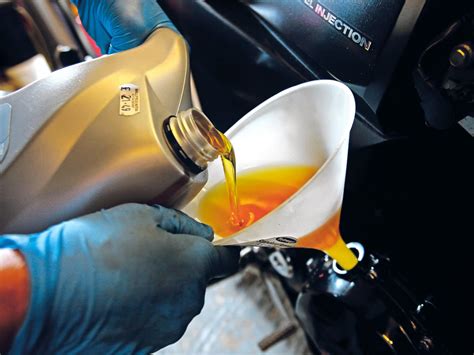 Slick operation! How to change your motorbike oil and filters | MCN