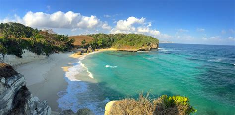 beaches in sumba - beautiful clear preserved ocean in sumba surf camp