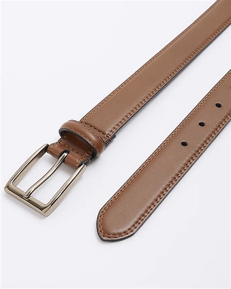 Brown faux leather buckle belt | River Island