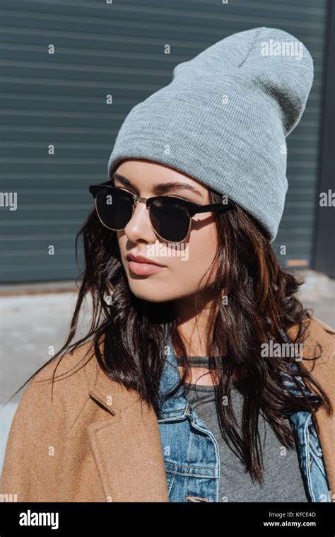 Woman in autumn outfit and black sunglasses Stock Photo - Alamy