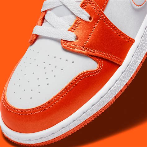 Air Jordan 1 Mid Metallic Orange DM4228-800 | SneakerNews.com