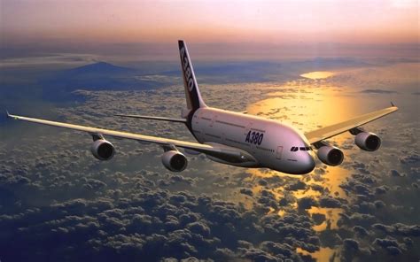 A Plane flying at sunset wallpapers and images - wallpapers, pictures ...