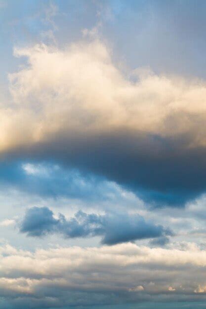 Premium Photo | Clouds in blue winter sky in evening