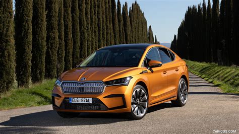 Škoda ENYAQ Coupe iV | 2022MY (Color: Phoenix Orange) | Front Three-Quarter