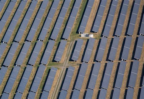 Aerial View of Rows of Solar Panels on a Field Stock Image - Image of ...