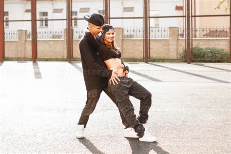 Beautiful couple dancing hip-hop. 9855372 Stock Photo at Vecteezy