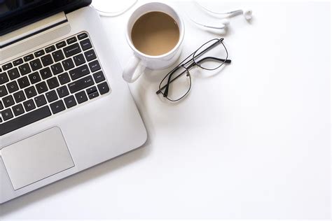 Laptop on desk with coffee - StockFreedom - Premium Stock Photography