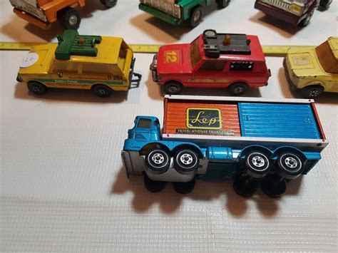 VINTAGE TRUCK, SUV, MATCHBOX AND TIN TRUCKS