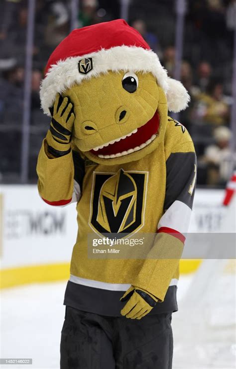 The Vegas Golden Knights mascot Chance the Golden Gila Monster reacts ...