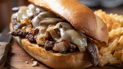 The Absolute Best Way To Prepare Onions For A Classic Philly Cheesesteak