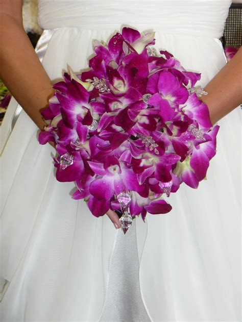 purple orchid bouquet | Purple orchid bouquet, Bridal bouquet flowers ...