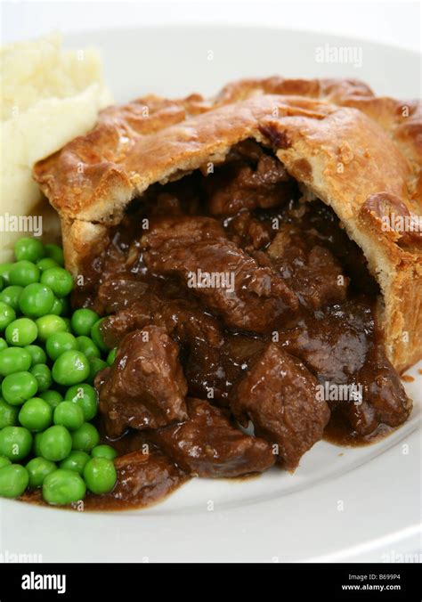 Steak pie with gravy Stock Photo - Alamy