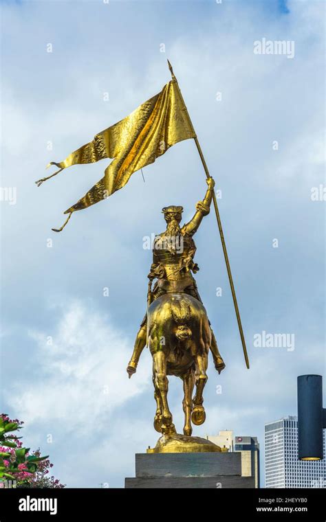 Golden bronze Joan of Arc Maid of Orleans statue in the French Market ...