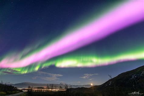 Solar Storm Causes Neon-Pink Northern Lights to Fill the Sky