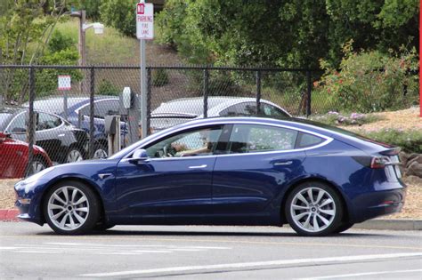 All Leaked Spy Shots Of The Blue Tesla Model 3