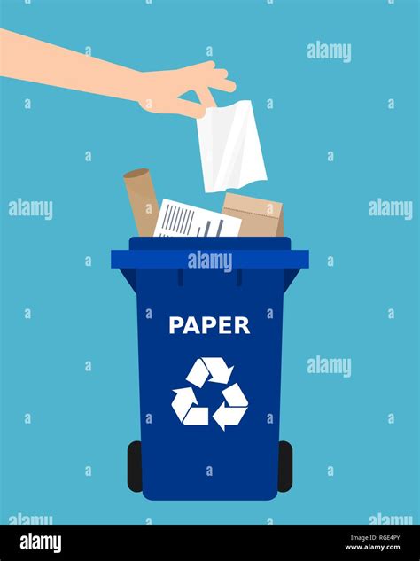 Hand throwing a paper into a recycle bin. Paper recycling, segregate ...