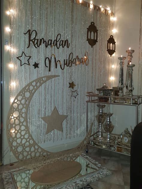 a room decorated with lights and decorations in the shape of a crescent ...