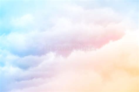 Rainbow Clouds. A soft cloud background with a pastel colored orange to ...