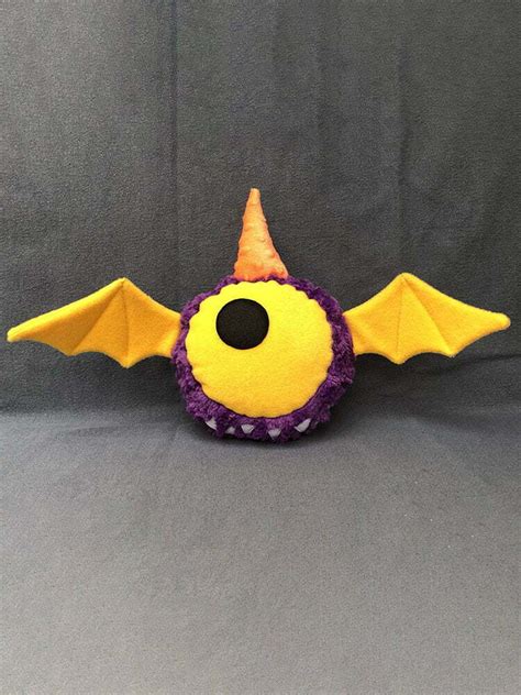 Mellow, the purple people eater plush monster