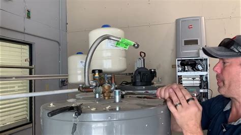 Rheem water heater anode rod removal - YouTube