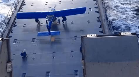 Video: Small Aircraft Lands On a Cargo Ship