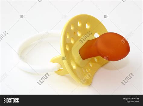 Yellow Pacifier Image & Photo (Free Trial) | Bigstock