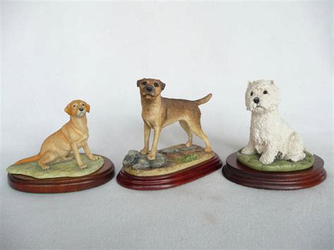 Lot 1049 - Three Border Fine Arts Dogs, 'Border