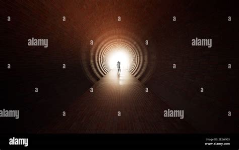 Concept or conceptual dark tunnel with a bright light at the end or ...