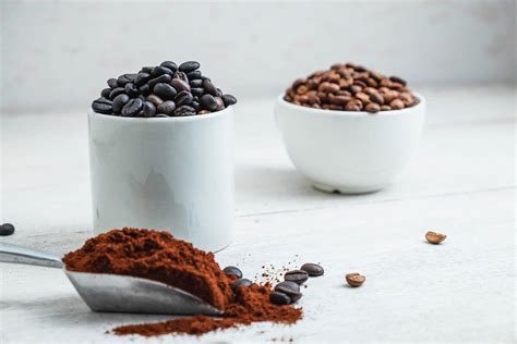 Dark and medium coffee beans 2158675 Stock Photo at Vecteezy