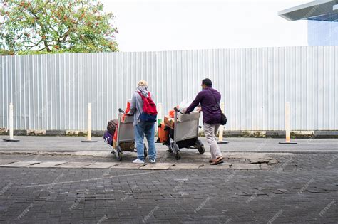 Premium Photo | Passenger activity when leaving the airport terminal to ...