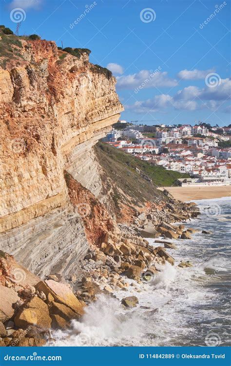 The Cliff on the Coast of Atlantic Ocean in Nazare Coastline. Stock ...