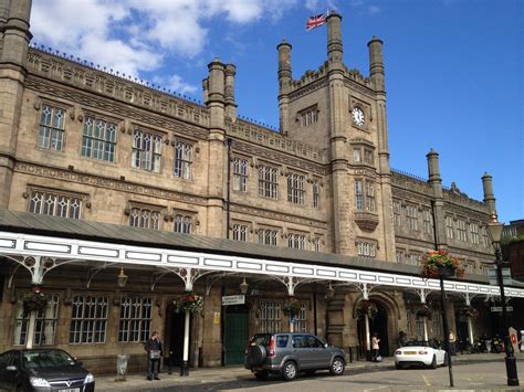 Shrewsbury railway station is built in a mock Tudor architectural style ...