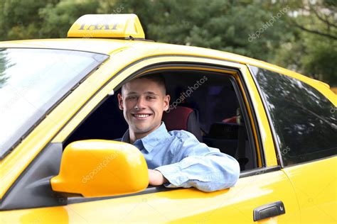 Taxi driver near car — Stock Photo © belchonock #124917666