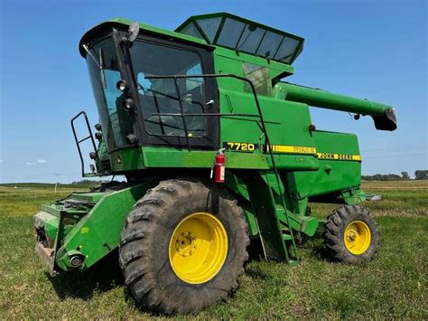 John Deere 7720 Combine Titan II - Fragodt Auction and Real Estate LLC