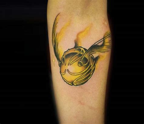 Golden Snitch tattoo by Minh Luurangon | Photo 24964