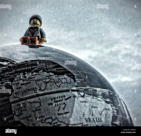 Sitting on top of the world Stock Photo - Alamy