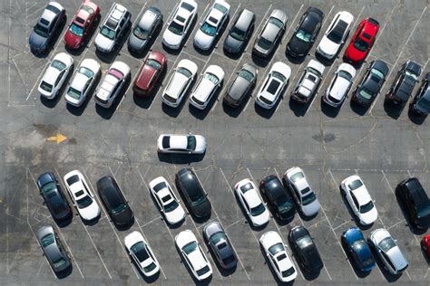 These maps show how parking lots "eat" U.S. cities - Big Think